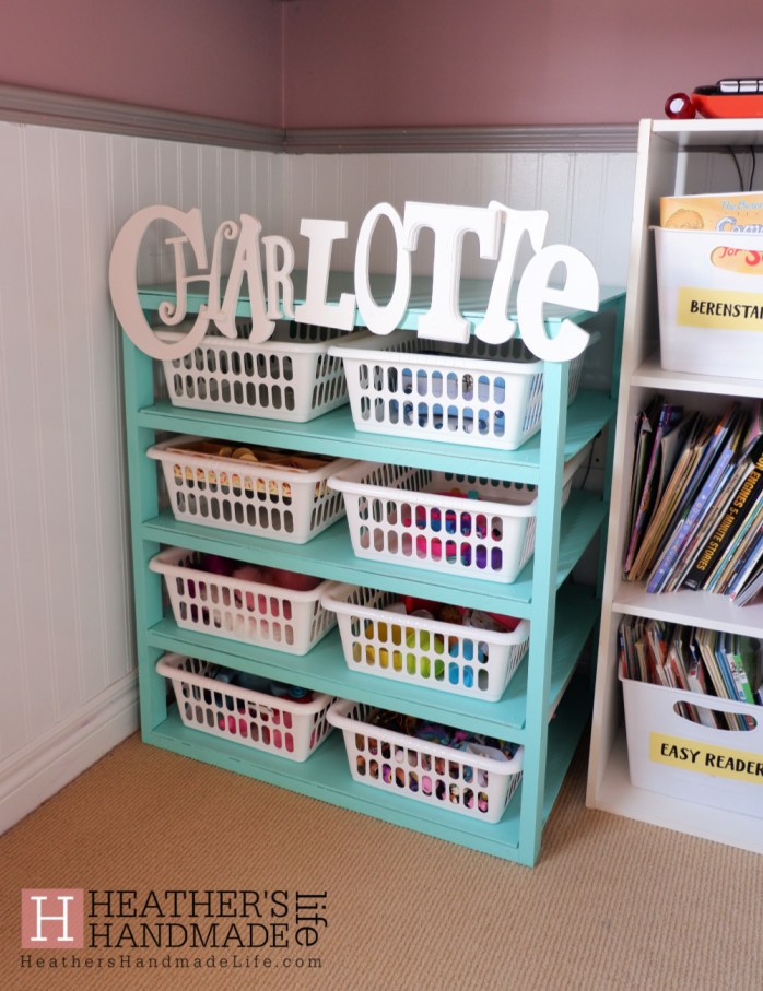 Kids need bins for all their crap! How I used scrap wood and Dollar Store bins to organize my daughter's precious junk {Heather's Handmade Life}