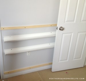 DIY rain gutter bookshelves for just $12 {Heather's Handmade Life}