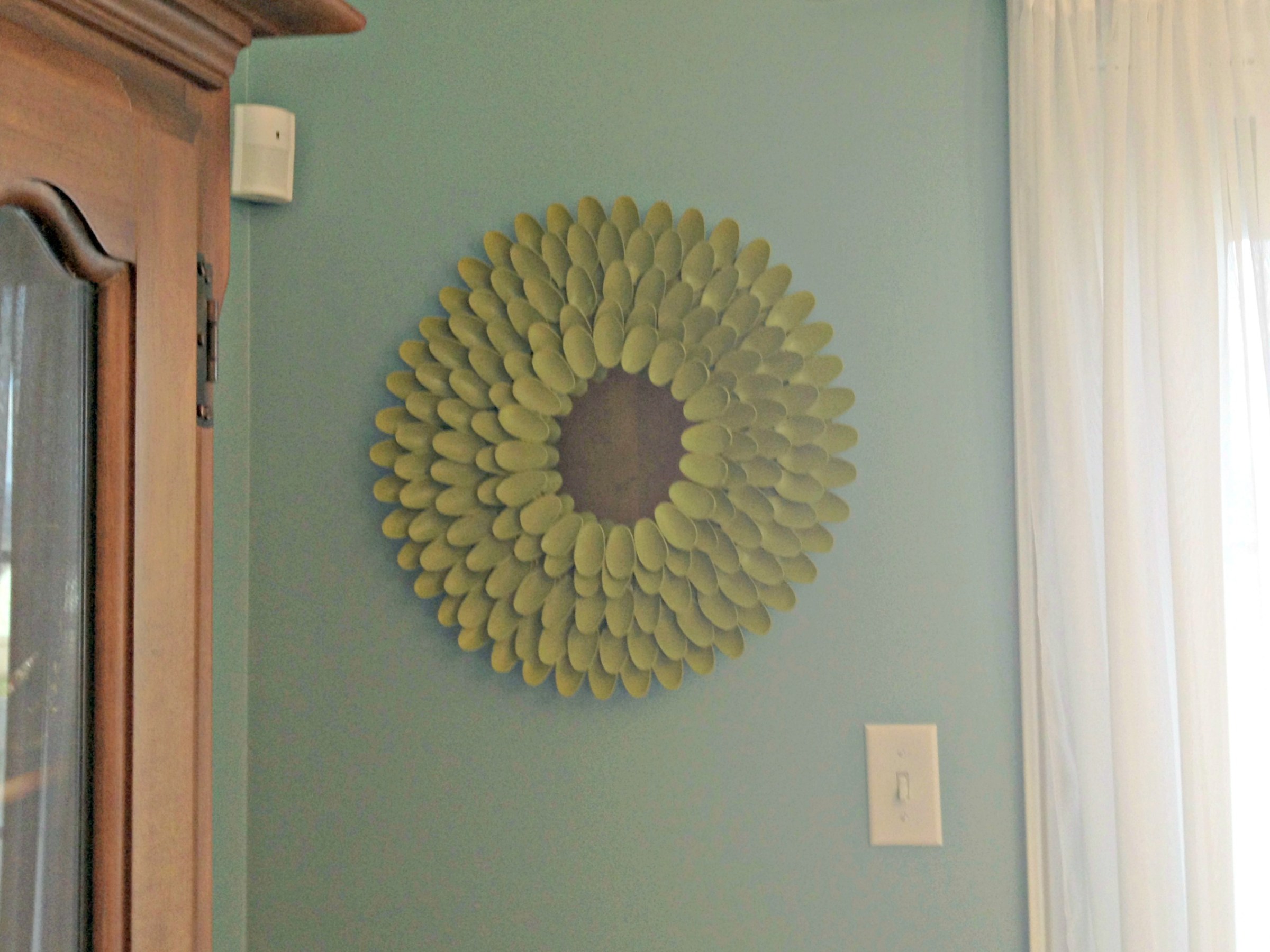 DIY chrysanthemum mirror from plastic spoons {Heather's Handmade Life}